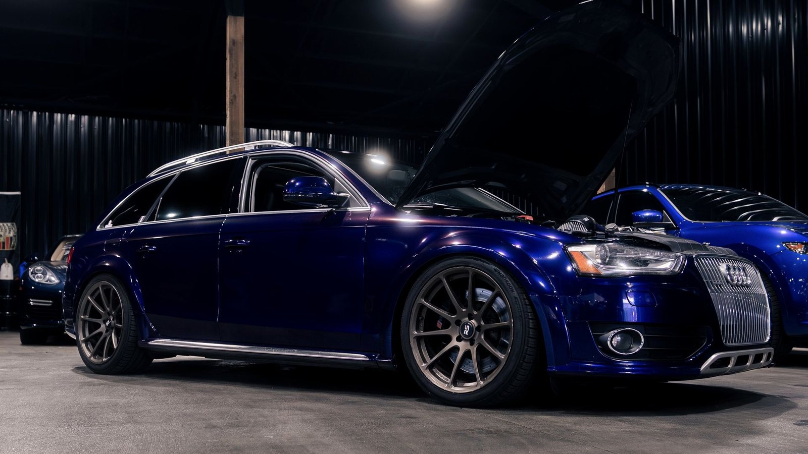 Custom Audi allroad with the hood up at Bluegrass Precision Motorwerks