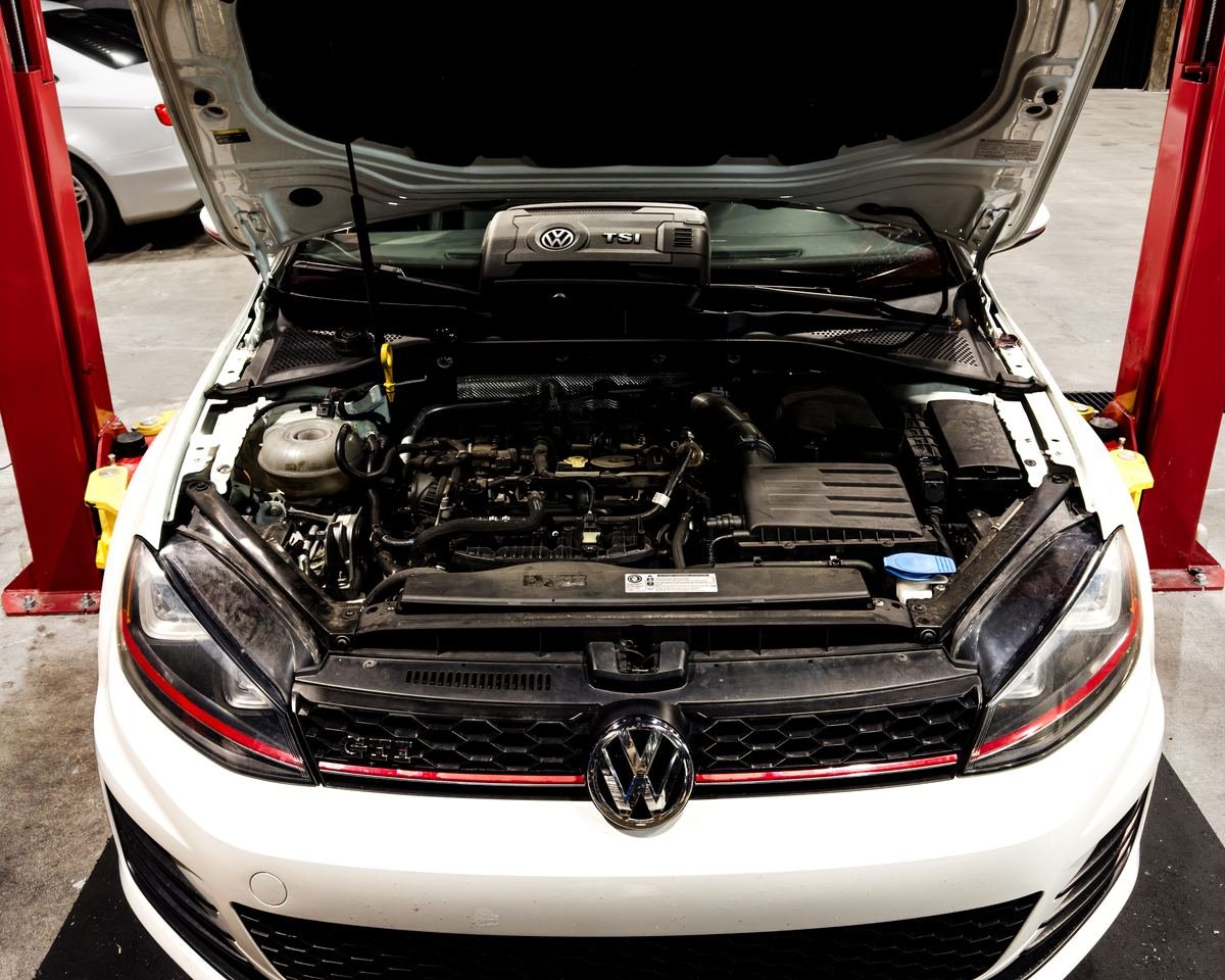 Volkswagen GTI engine bay during service at Bluegrass Precision Motorwerks
